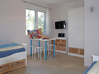 Das erste Schlafzimmer im Dachgeschoss - viel Platz für Kinder